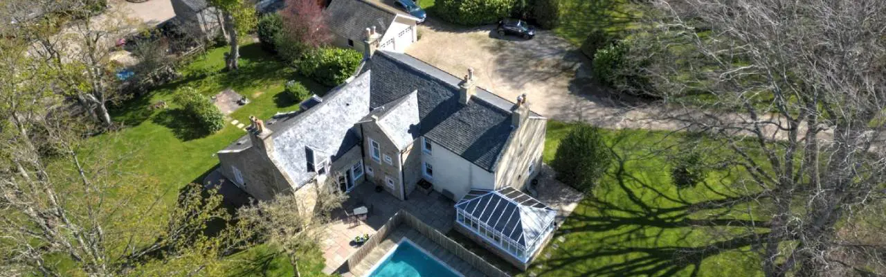 Impressive Traditional Farmhouse with Heated Outdoor Pool: Coltfield Farmhouse Aerial View